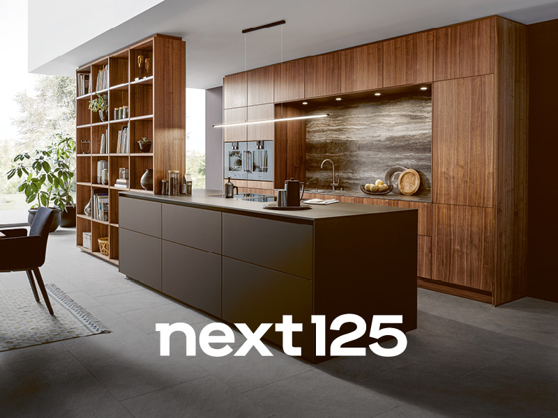 Bild zeigt eine hochwertige Küche von next125 mit next125-Logo