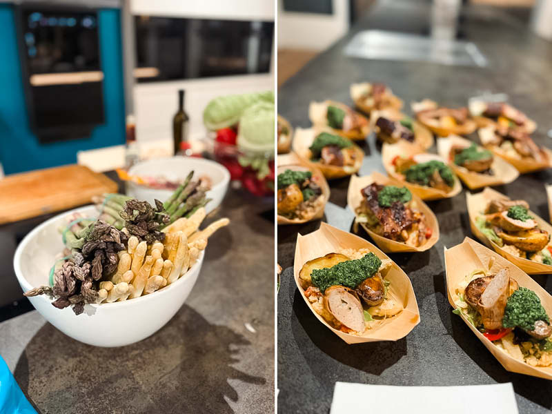 Catering mit Spargelvariationen und Fingerfood-Burgern in stilvoller Küchenumgebung.