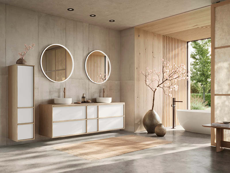 Großzügiges Nobilia Badezimmer mit Doppelwaschtisch in Holzoptik, runden Spiegeln und viel Stauraum, kombiniert mit natürlichem Licht und klarer Architektur