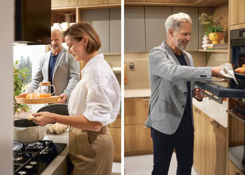 Paar beim gemeinsamen Kochen in einer modernen Küche von SPECHT Küchen – Frau am Gaskochfeld und Mann am Backofen in wohnlicher Küche mit Holzfronten.